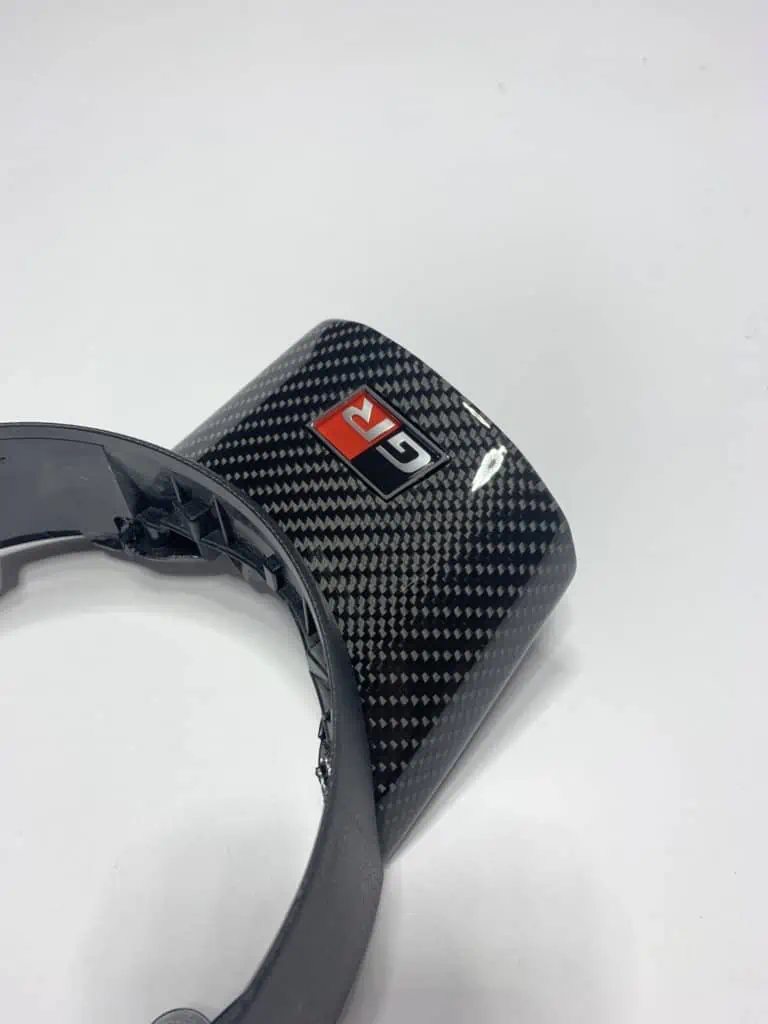 Toyota Yaris GR carbon steering wheel clasp macro